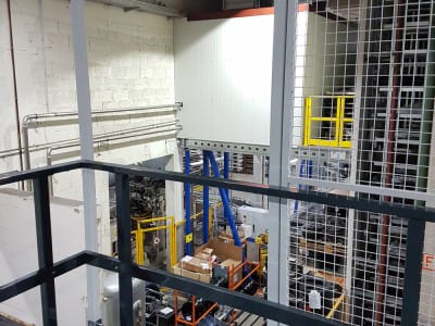 Delivery and installation of mezzanine shelving system. 5